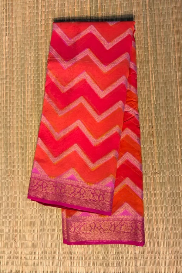 Tricolour Red, Orange and Magenta Zigzag Semi Chiffon Saree with Purple Border