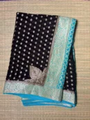 Black and Sky Blue Small Butta Pure Georgette Saree 1